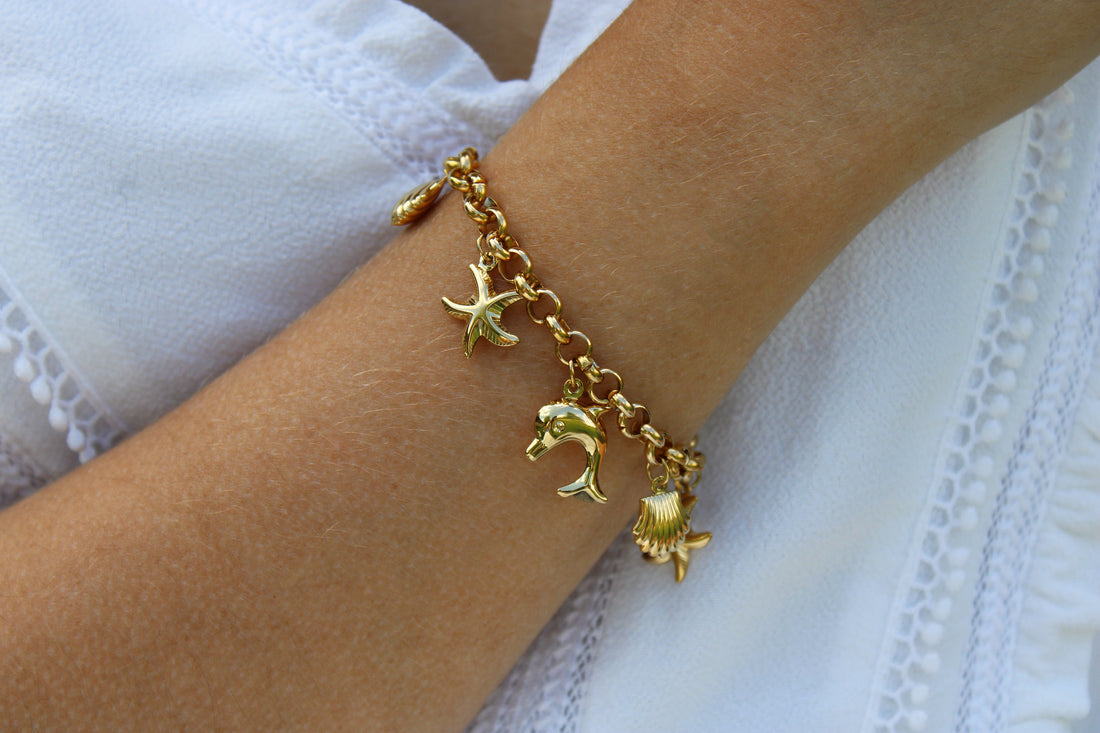Nélia | Bracelet breloques et charms dorés en acier inoxydable